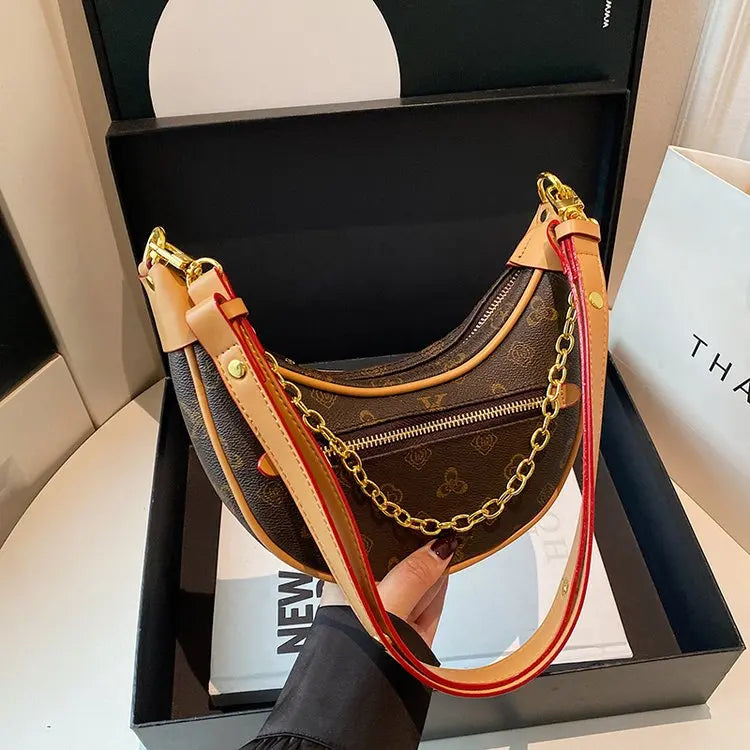 Light luxury crocodile embossed crescent-shaped bag 2025073122