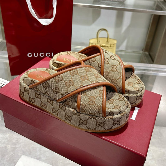 GG cross-upper thick-soled flip-flops 0725052901