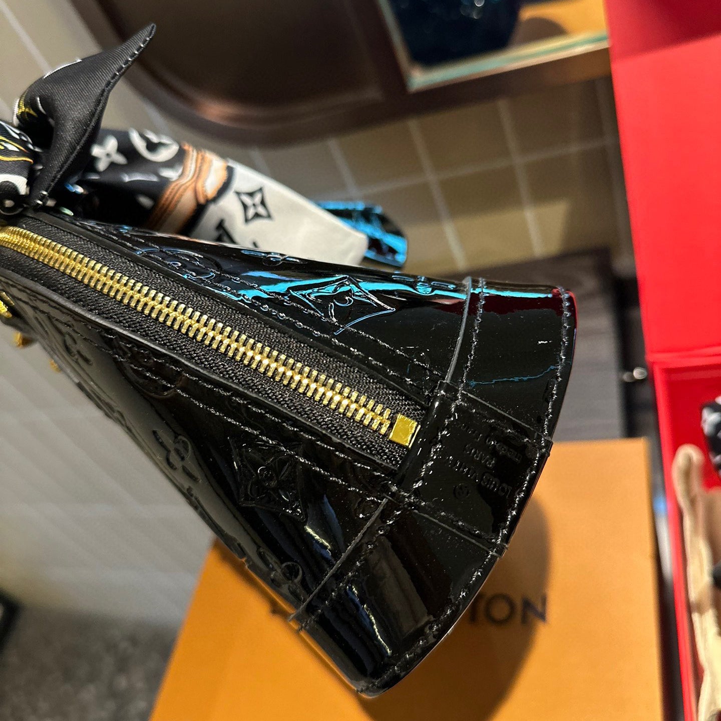 Embossed bright leather Alma shell bag 1824041702