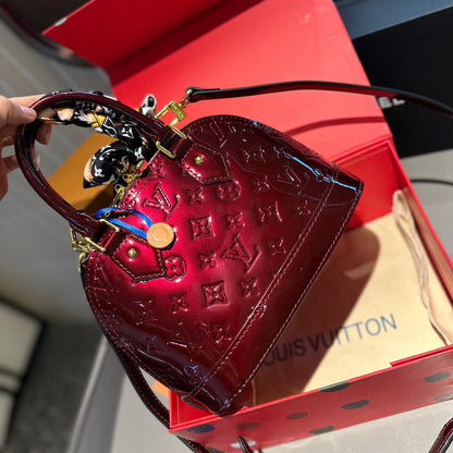 Embossed bright leather Alma shell bag 1824041702