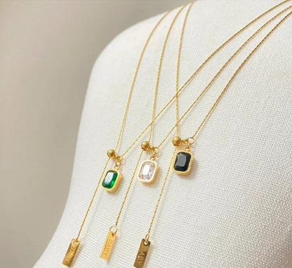 A green necklace with tassels 2025081214