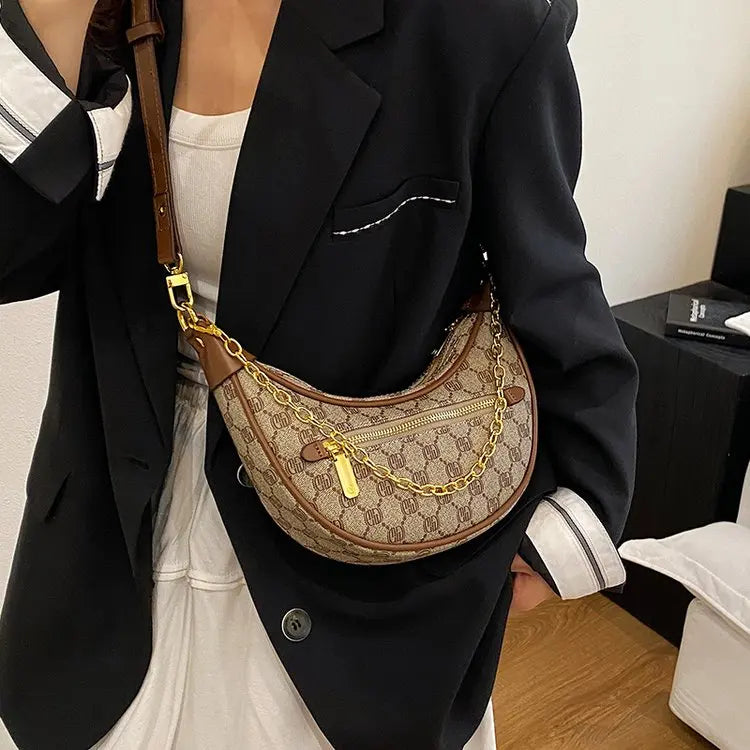‌Light luxury crocodile embossed crescent-shaped bag 2025073122